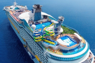 aerial image of the top deck of the Voyager of the Seas featuring slides and different activities. 